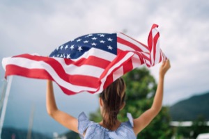 Girl waving US Flag