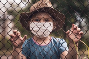 Immigrant child with mask